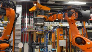 Kuka Robot demoulding a carbon fiber wheel in Carbon Revolution's factory